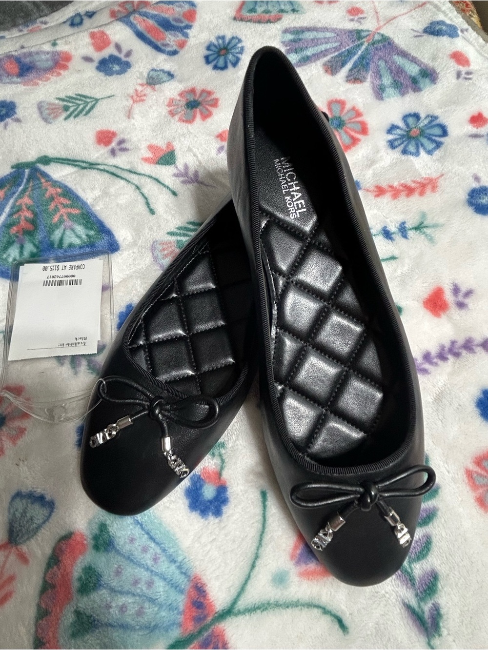 MICHAEL Michael Kors Black Quilted Ballet Flats with Bow and Silver Accents